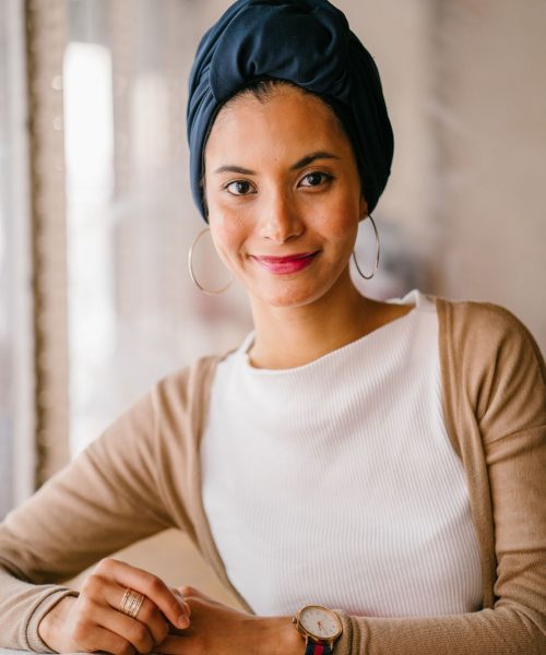a Woman Educator reading a book